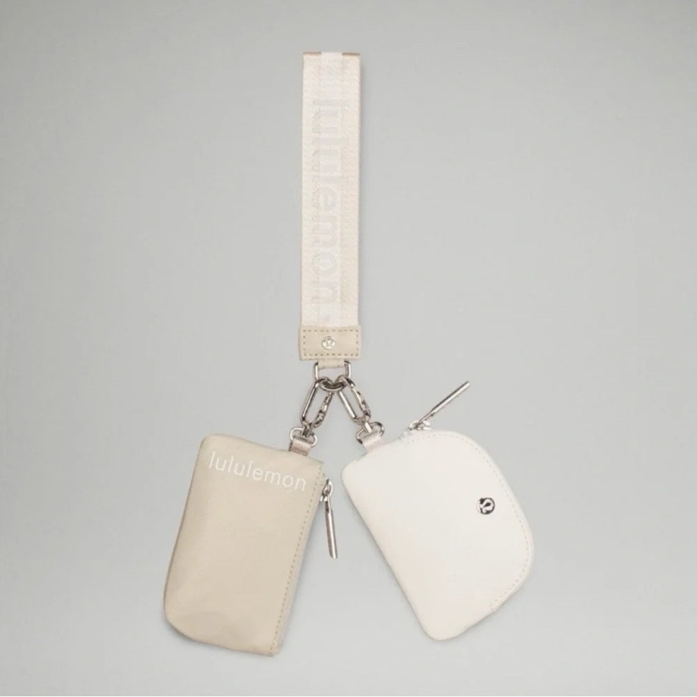 6-14 Lululemon Dual Pouch Wristlet Wordmark - Raw Linen/White Opal/White